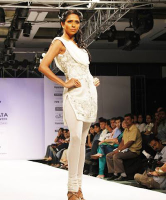 Candice Pinto walks on ramp