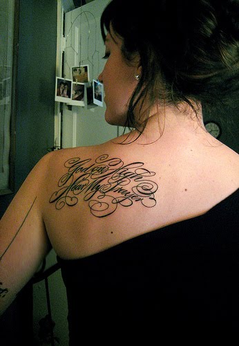 cursive tattoos for women on back shoulders