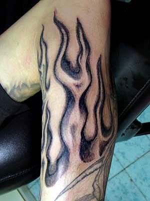 The flame tattoo is a powerful representation in many different cultures The flame tattoo is a powerful representation in many different cultures
