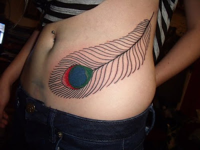 feminine peacock feathe tattoos for girls side tattoos