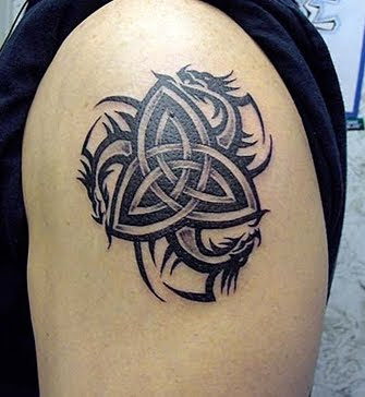 celtic trinity tattoo with dragon on shoulders