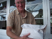 Geoff holding our order of Fish n Chips!
