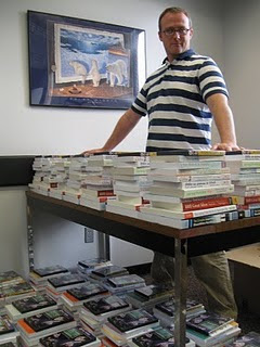 photo of Steve Wilson with project books