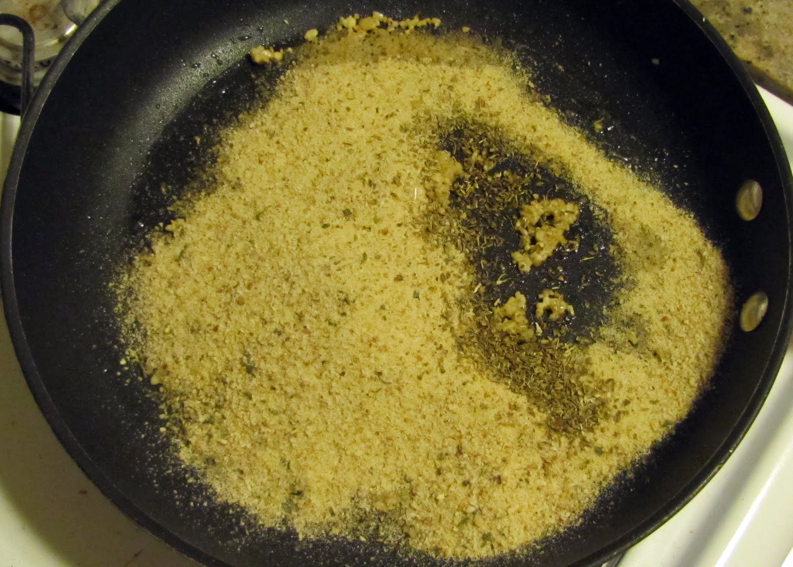 [crumbs,+oregano+and+lemon+peel+added+to+garlic.jpg]
