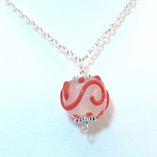 red dot and swirl lampwork bead necklace