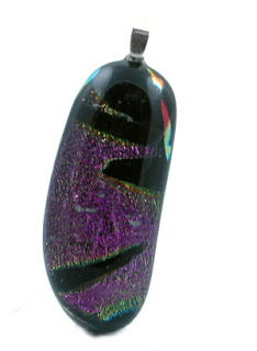 pink and black striped glass talisman pendant