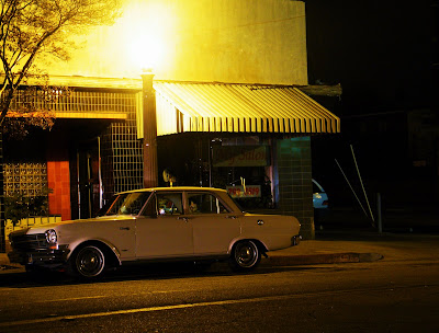 A night shot a classic car Too bad it wasn't in front of the library