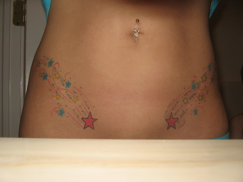 Belly button piercing, star tattoos, hurt like a bitch but worth it in  title=