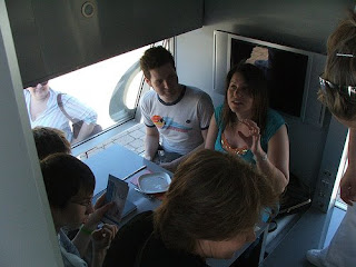 A tight squeeze round the table in a Micro Compact Home - photo by evilcoffee