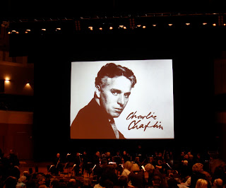 Audience leaving the Ulster Orchestra's performance of a score to accompany Charlie Chaplin films in the Belfast Waterfront