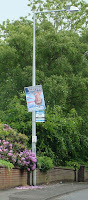 UCUNF poster for Daphne Trimble hanging upside down on Lisburn's Belsize Road