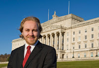 Steven Agnew - leader of the Green Party in Northern Ireland - standing outside Parliament Buildings at Stormont