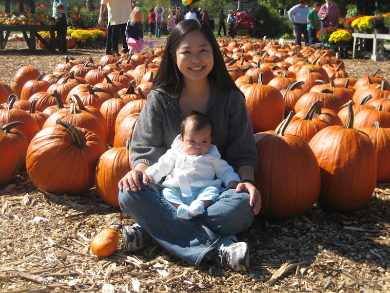 Mommy and me amongst the pretty pumpkins.