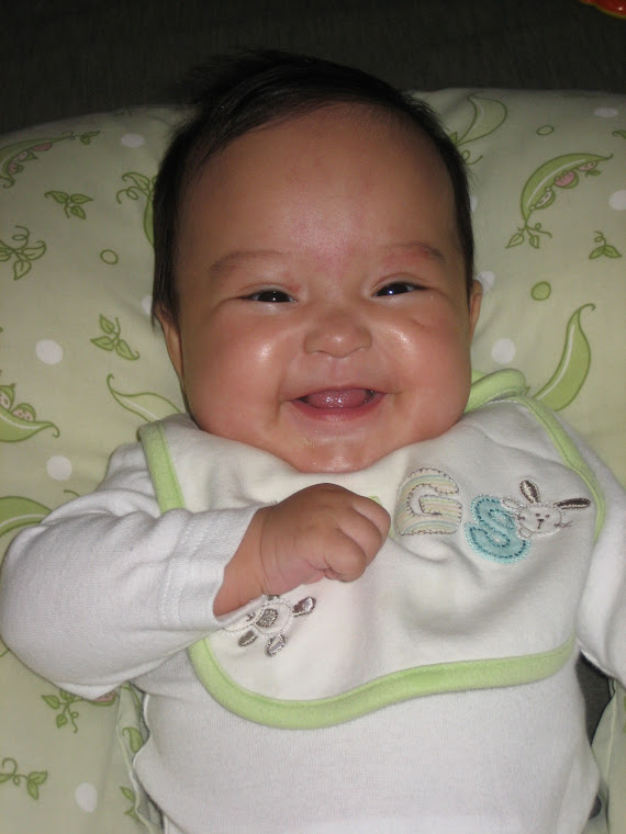 I am very smiley these days.  I love being 5 months old!