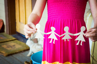 paper dolls holding hands