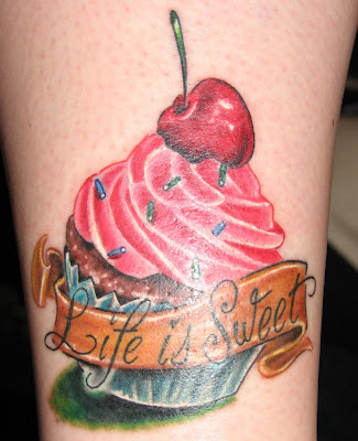 My new cupcake tattoo!! I LOVE it! It took me a while to find the right 