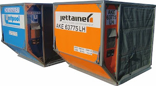 If cargo containers like these are under your seat, do you imagine they are going to let you make a call on your mobile? air freight containers