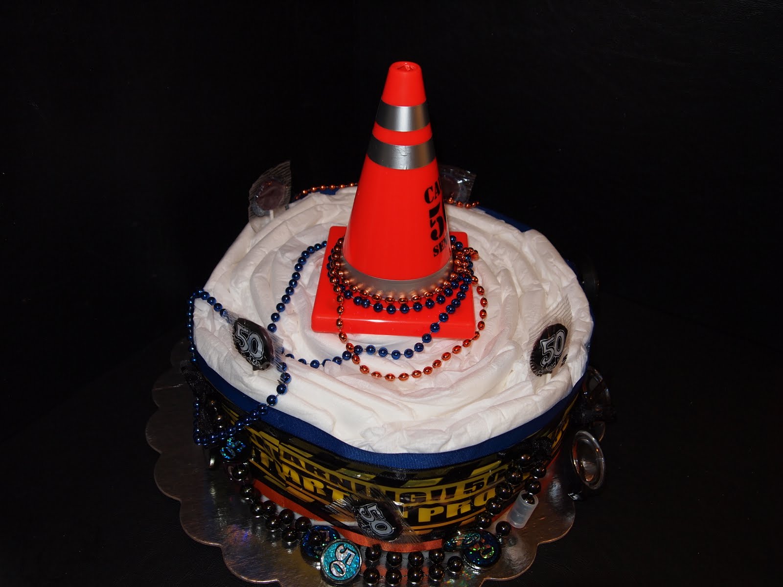 Adult Diaper Cakes are made out of, you guessed it, adult diapers. Adult Diaper Cakes are made out of, you guessed it, adult diapers.