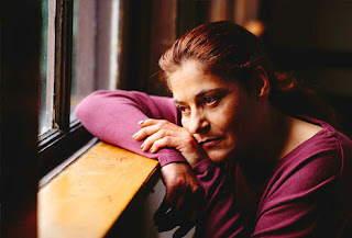 photolibrary_rf_photo_of_woman_looking_out_window.jpg