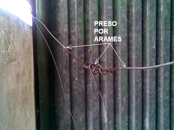 [PRESO+POR+ARAMES.JPG]