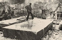 A worker uses a special burner to finish a slab of Pyramid Blue granite. Photo: Courtesy of Fendley Enterprises Inc.