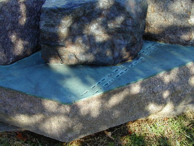 MORSE CODE COPPER PLATES: Kryptos extends beyond the courtyard to the other side of the new building: There, copper plates near the entrance bear snippets of Morse code, and a naturally magnetized lodestone sits by a compass rose etched in granite