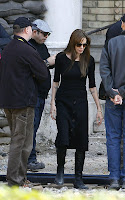 Angelina Jolie kissing Brad Pitt and working on her movie in Budapest