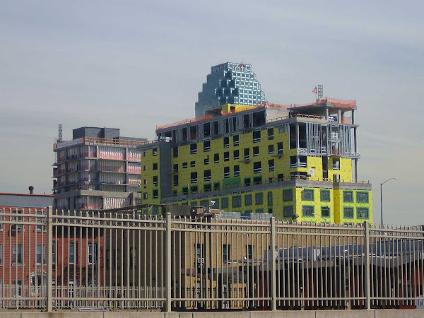 Pink Yellow Turquoise LIC - Same condo under construction in Long Island City, from the Pulaski Bridge.