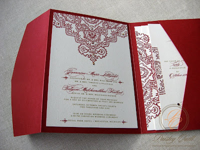 She chose a burgundy shimmer pocket fold with ivory shimmer insert cards