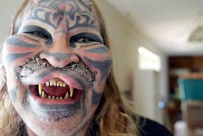 Ugliest Tattos on Odd  20 Strange Tattoos And Ugly Body Modifications L Cool Tattoos