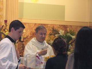 church bishop rededication mass scenes communion serratelli holy faithful giving