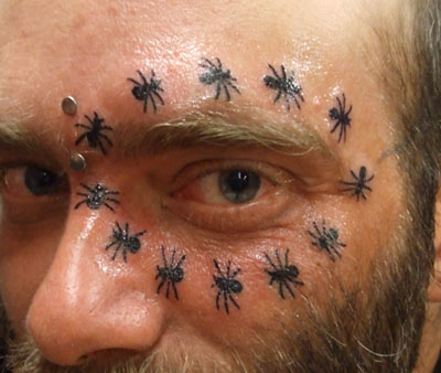 Marching Ants Face Tattoo. Posted by Kimono at 10:16 PM