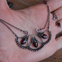 Garnet Fans Woven Necklace in Oxidized Sterling Silver on Hand