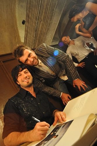 Turkish professional NBA basketball player Mehmet Okur with Tarkan