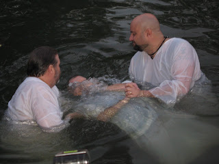 Dr. Yates getting baptized