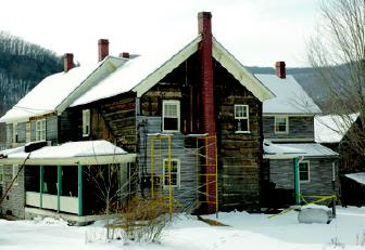 1850 McLaughlin house being torn down in Marlinton
