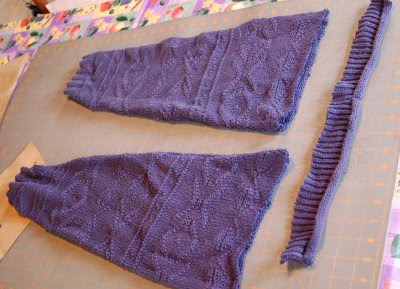 Oversized sweater, sleeves and collar recut
