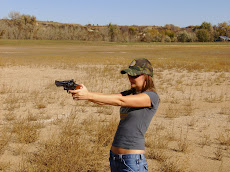 Freeze!!! Woman with Gun.