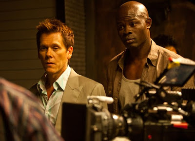 Kevin Bacon and Djimon Hounsou on the set of Elephant White in Bangkok, March 2010.