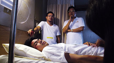 Visute, right, on the set of Phobia 2 and his segment, Ward, starring Dan Worawech, in bed.