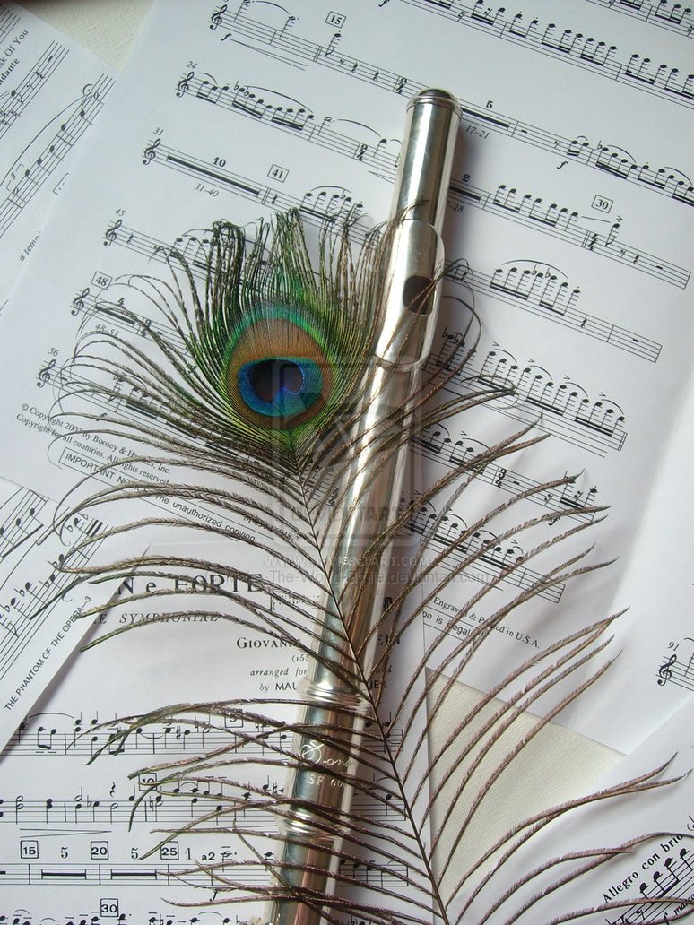 flute and peacock feathers
