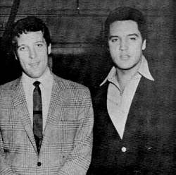 and elvis presley sitting on a ...