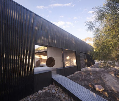 The Dark House designed by Opat Architects