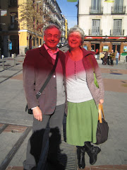 the ruby wedding couple under the christmas light spots in chueca