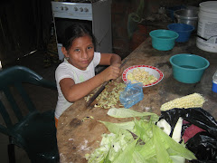 Little Girl Cutting Her Vegetables