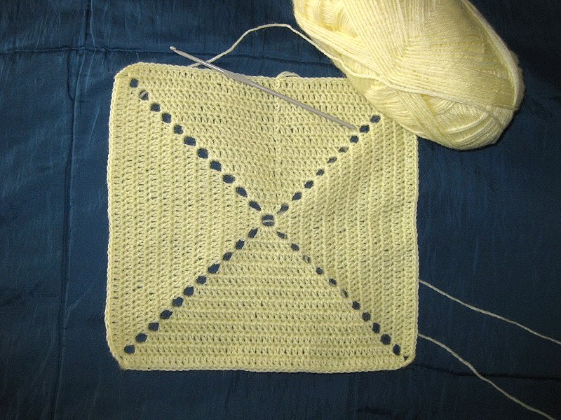 Serena Lewis: The baby blanket/shawl is under way...