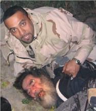 [saddam+spider+hole.JPG]