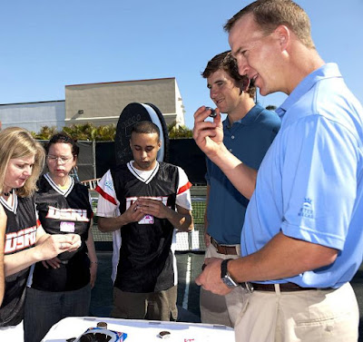 Black Tennis Pro's Eli and Peyton Manning Double Stuff Racing League