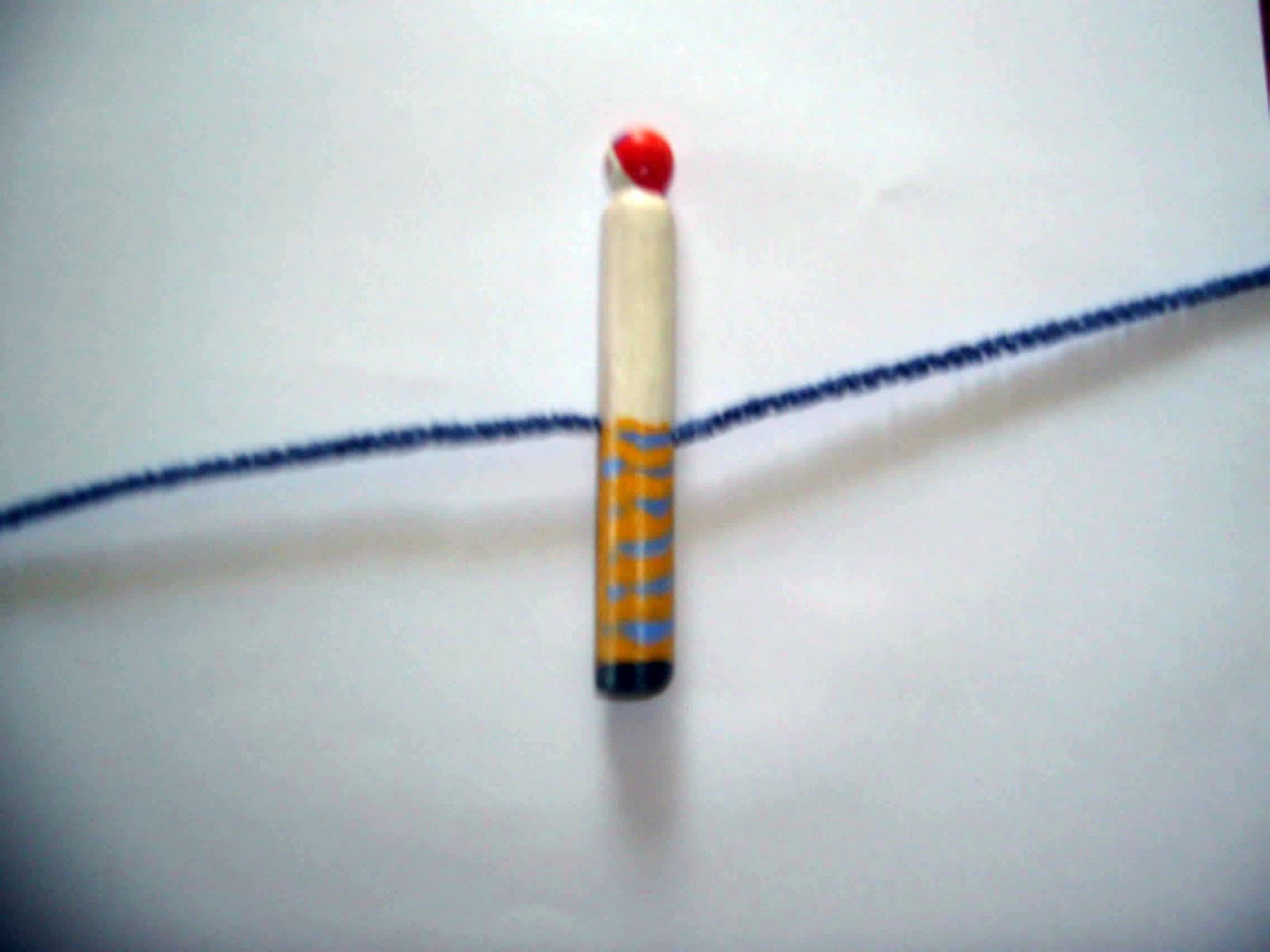 [chenille+stick+through+legs.jpg]