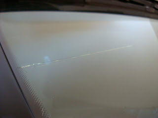 Close up of crack in windshield 